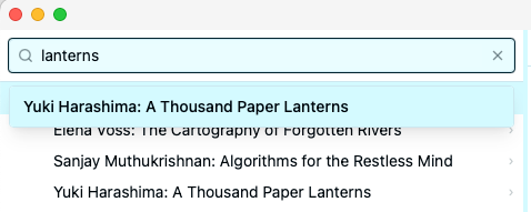 Search bar with a typed query and the dropdown showing matching results with title and context snippet